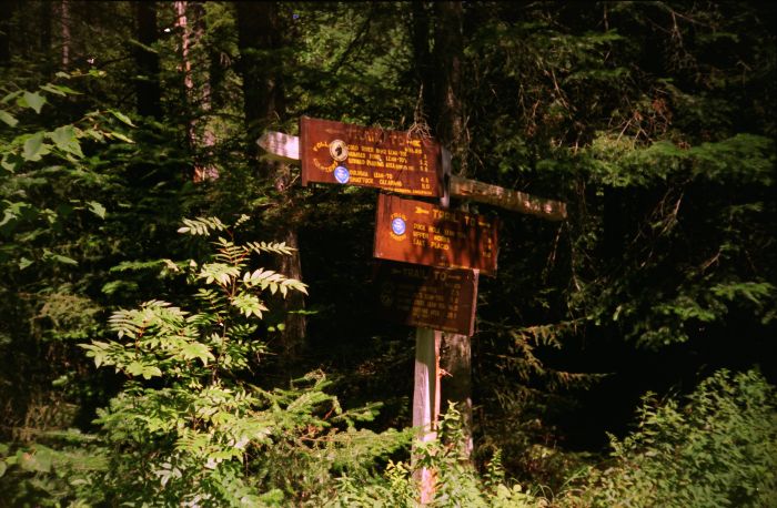 Lower sign points to the ford of the Cold River and trail to Northern Leantos.
