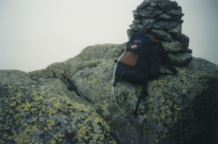 On Wednesday (Day 7) I day-hiked from my Panther Gorge camp to this heavily overcast summit of Haystack in about 2 hours. The climb to Haystack from Panther Gorge is very steep; at one point I slipped, ascending a rock slab, and rolled to my left to grab some scrub balsams.
