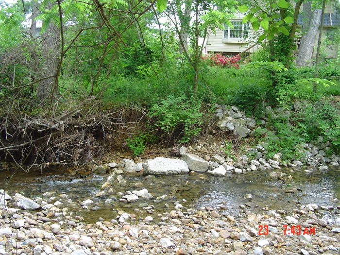 Five minutes from home, I've rock-hopped across Roland Run. This shot looks back at my crossing point, with the rear of one of my neighbors' Jeffers Road houses visible.