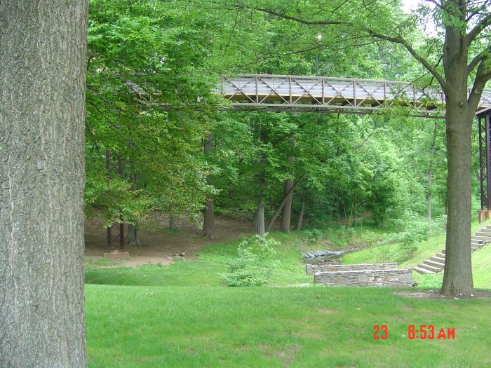Swinging around the Student Union building, I reach the west end of Towson University's wonderful Glen, a wooded area with a few old stone shelters and benches. ET 1:15