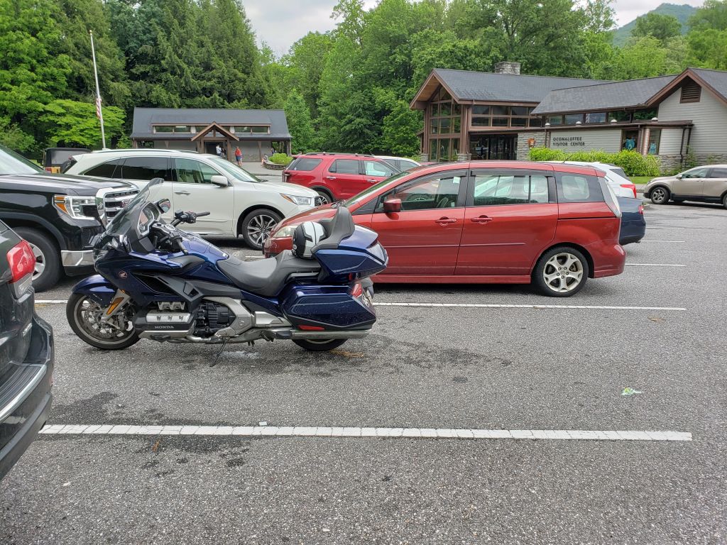 Aha! It's actually the Oconaluftee Visitors' Center (I guess it's on Cherokee land), and I found it perhaps a quarter mile or so west of the BRP-441 T intersection.