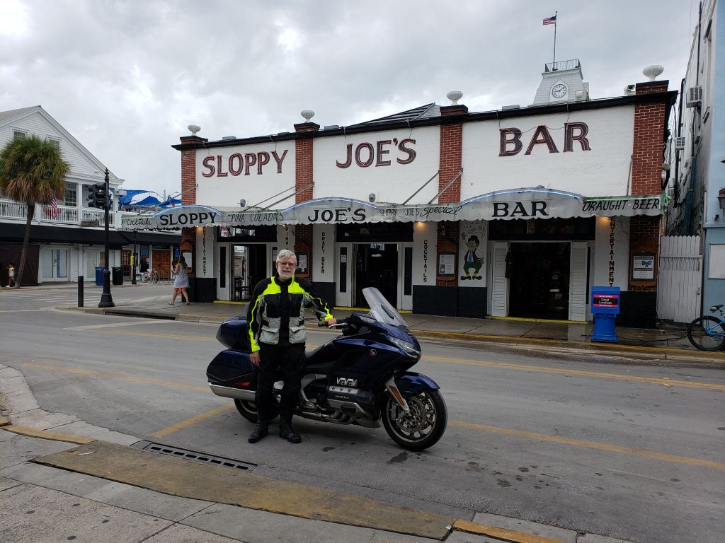 We took a zero at Danielle and Paul's on May 31 and rode to Florida City (Travelodge) June 1. Fearing an upcoming storm, we left at 6AM on June 2 and made Key West at 9AM. First goal: This photo! Dasher was guitarist with a band that played here about 25 years ago.