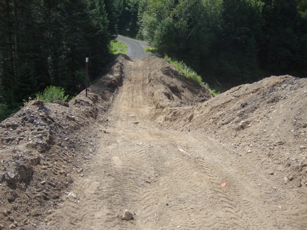 On his first walk around Goodnow Flow this year, John has descended to Shadow Dam, soon to receive a new culvert.