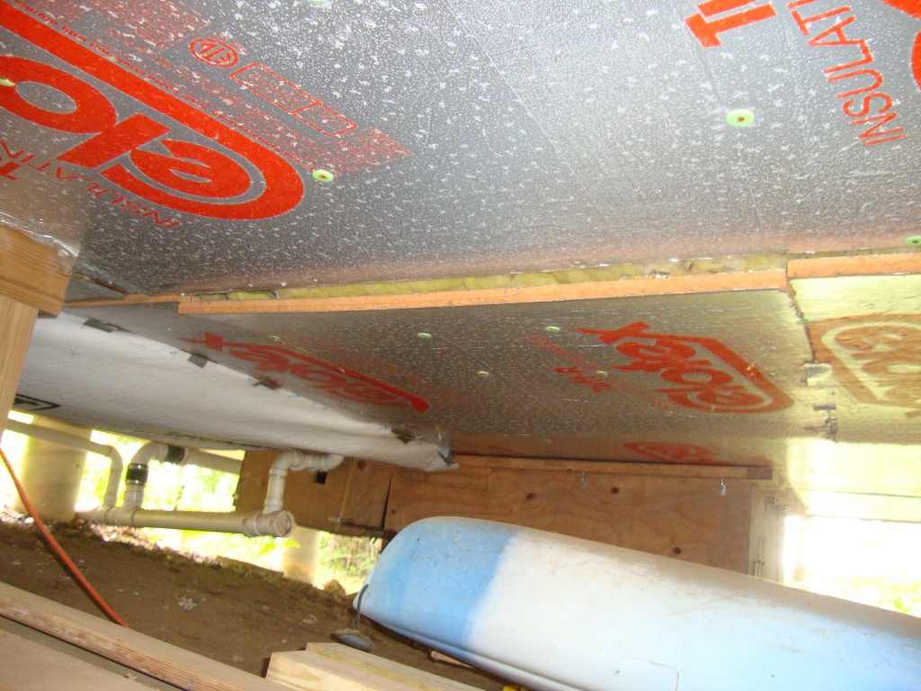 Working under the camp, I was not pleased to find this sagging of the high-R rigid panels. Chilly floors, here we come. View looks west, toward the doghouse.
