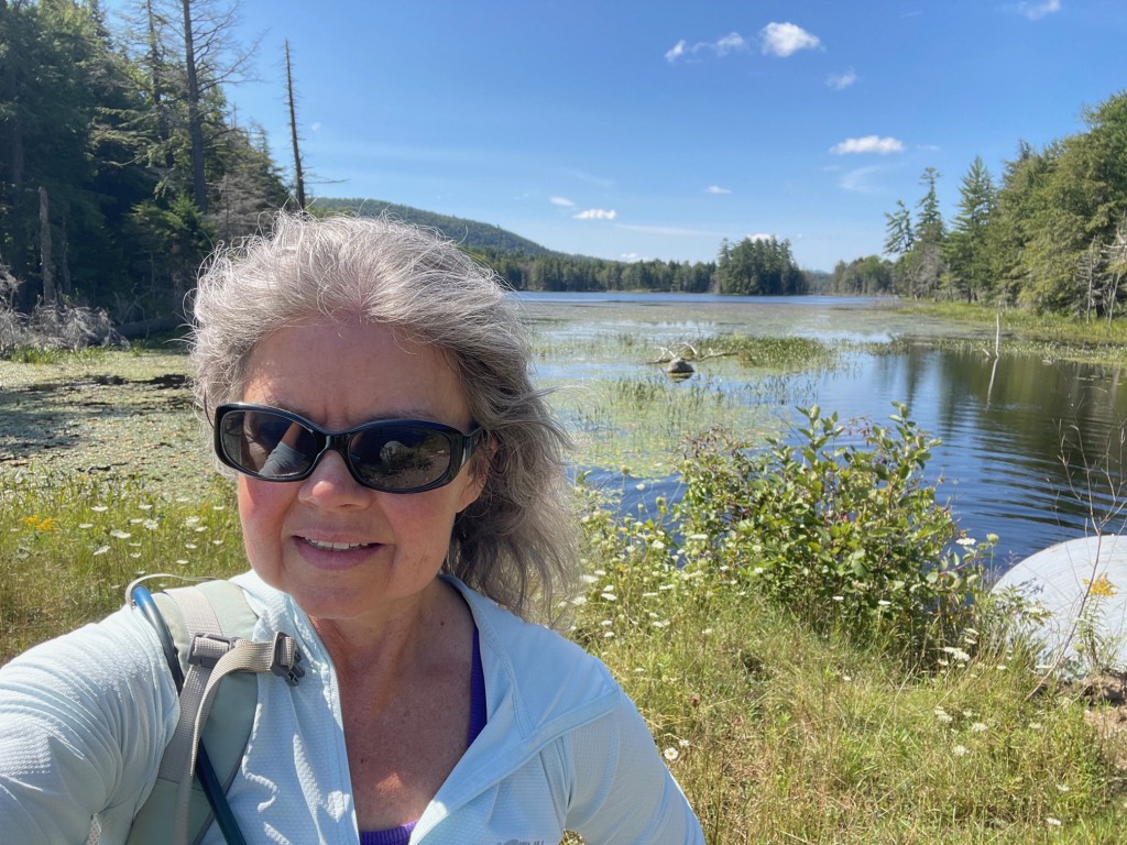 On her third day at camp, Andrea biked the Deer Pond loop and snapped this selfie at the Fifth/Sixth Lake culvert.