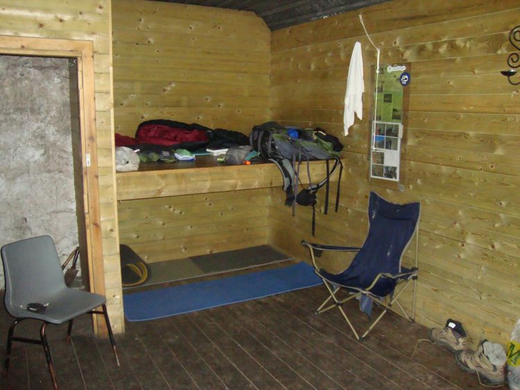 Here's my Corrour Bothy setup; I had the upper bunk all to myself. Warm, dry, plenty of room. This bothy was unique in having an inside toilet, in the brown wooden addition built onto the end. Very luxurious! [10:00 AM, July 4, 2011].