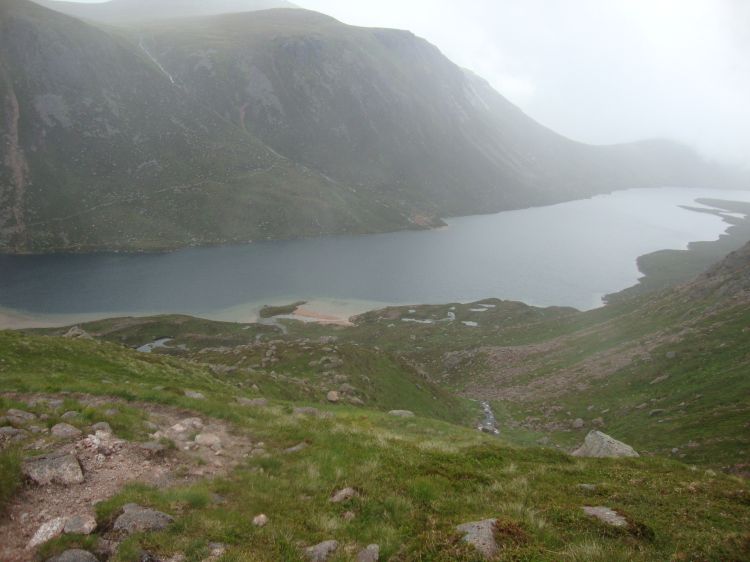 At 5:40 PM, an hour out of Hutchison, in mist and light rain I snapped this shot of the attractive Loch Avon, said to be the center of Cairngorms National Park. Shelter Stone, my goal, is down there somewhere. 