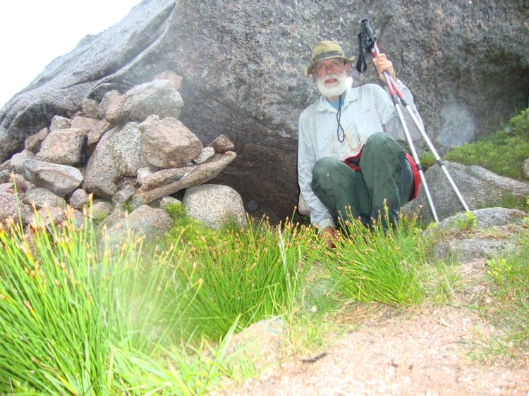 At 6:05 PM, with light rain and sleet and a steep trail, slick with pebbly gravel and sand, ahead of me, I decided this was as close as I was going to get to the real Shelter Stone. Hey, it's shelter (of sorts), and it's stone. I found several such makeshift arrangements... but missed the real Shelter Stone.