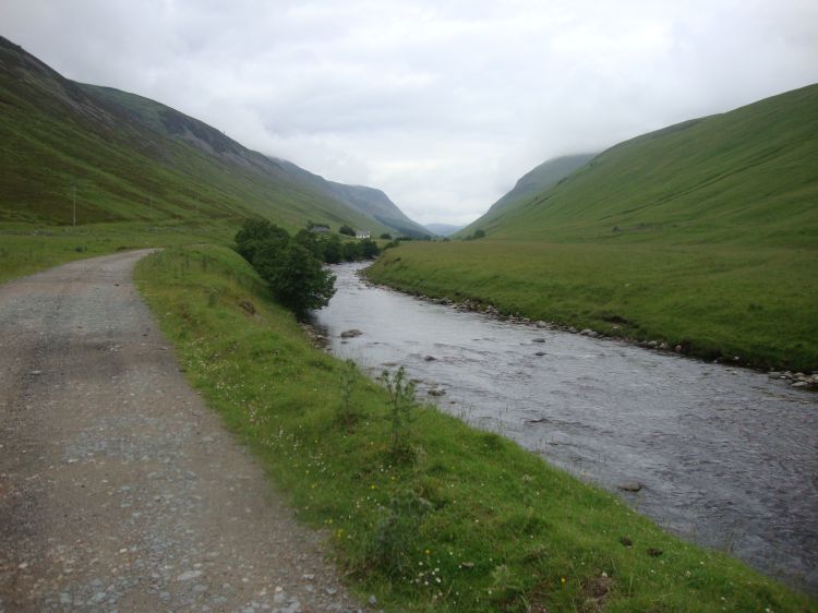 Midway through my last day of hiking, about 10:00 AM, this looks back east, along the River Tilt to the pass through which I'd come. It was 11 miles from Falls of Tarf to Blair Atholl, but most of it was easy walking. 
