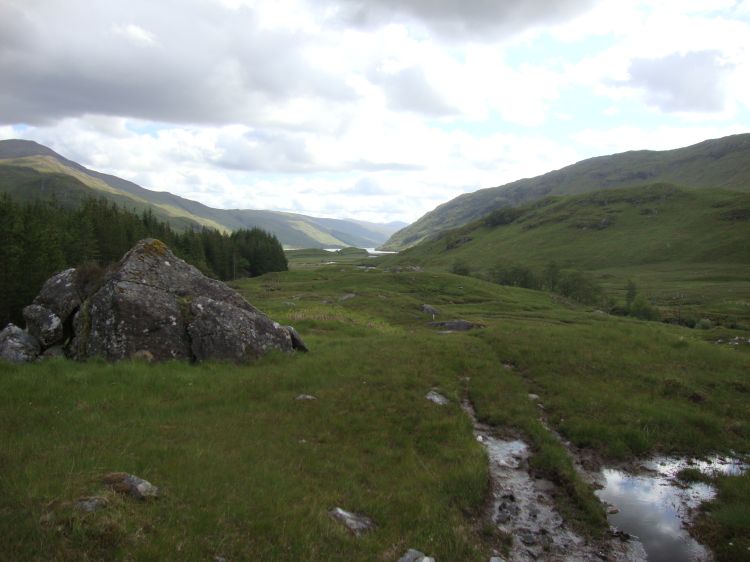 After deciding to scrap the Cape Wrath Trail, I began my walk back to Glenfinnan Friday morning (June 10) and photographed the west end of Loch Arkaig, from the bridge over the River Pean, about 10:15 AM. I turned right here, crossed the little wooden bridge, and headed back up the Allt Cairnean stream.