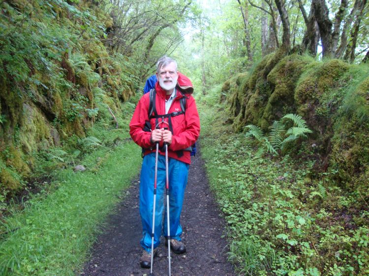 Monday morning June 13 (Day 18 of my trip), a pleasant young Scottish woman, hiking with her German boyfriend, snapped this photo. It's about an hour into the day's walk. The Way has crossed A82 and is now heading north along the east shore of Loch Oich.