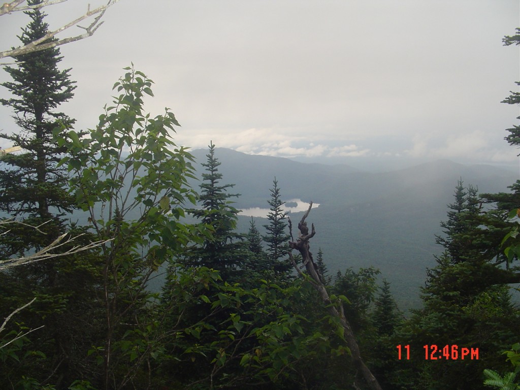 Fifteen minutes after leaving the Seward summit at 12:30, I took this shot of Upper Saranac Lake, I think. It was visible until about 2PM when we were too deep in the woods.