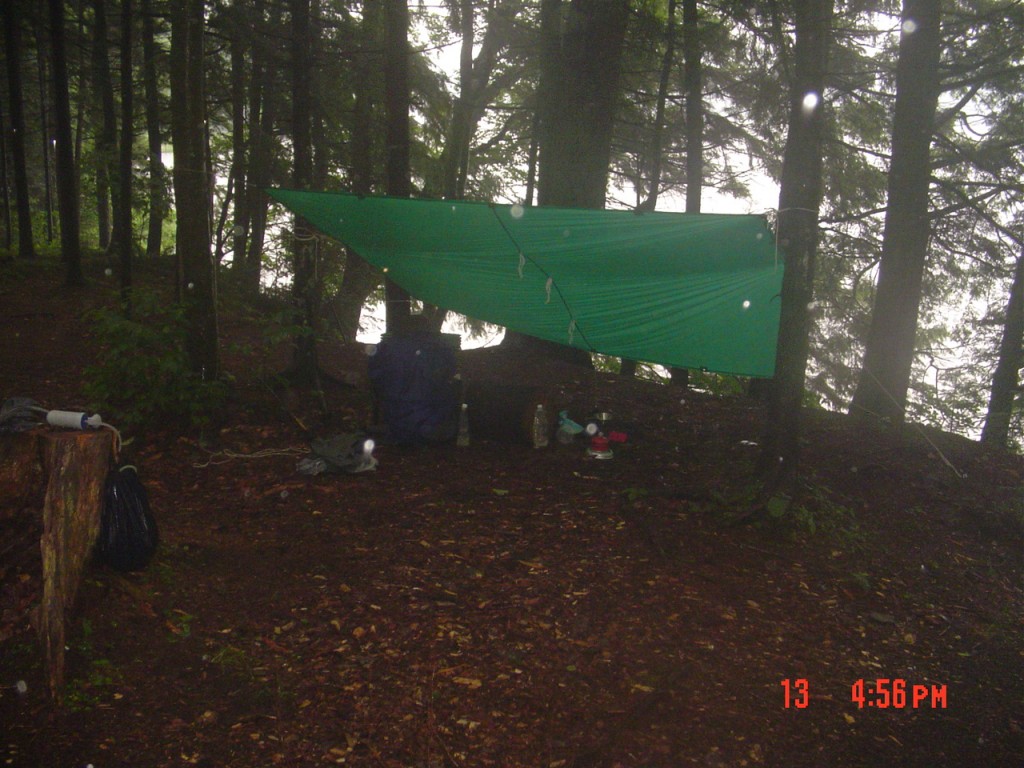 At 6:30 PM rain was still moderately hard. This worked pretty well, keeping me and my gear dry while I had dinner and considered sleeping arrangements