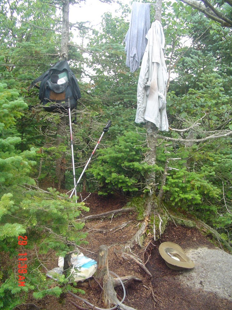 Beginning to pack up to leave Emmons; time to put those damp shirts back on!