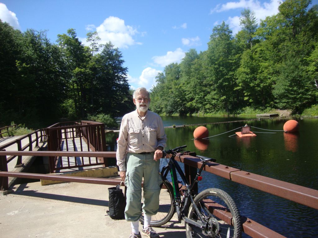Low's Upper Dam, the easy way!
The 25 minute ride from my truck was easy and smooth, on dirt roads (some just two wheel tracks). A canoeist, portaging around the dam, snapped this for me at 11:15 AM. 