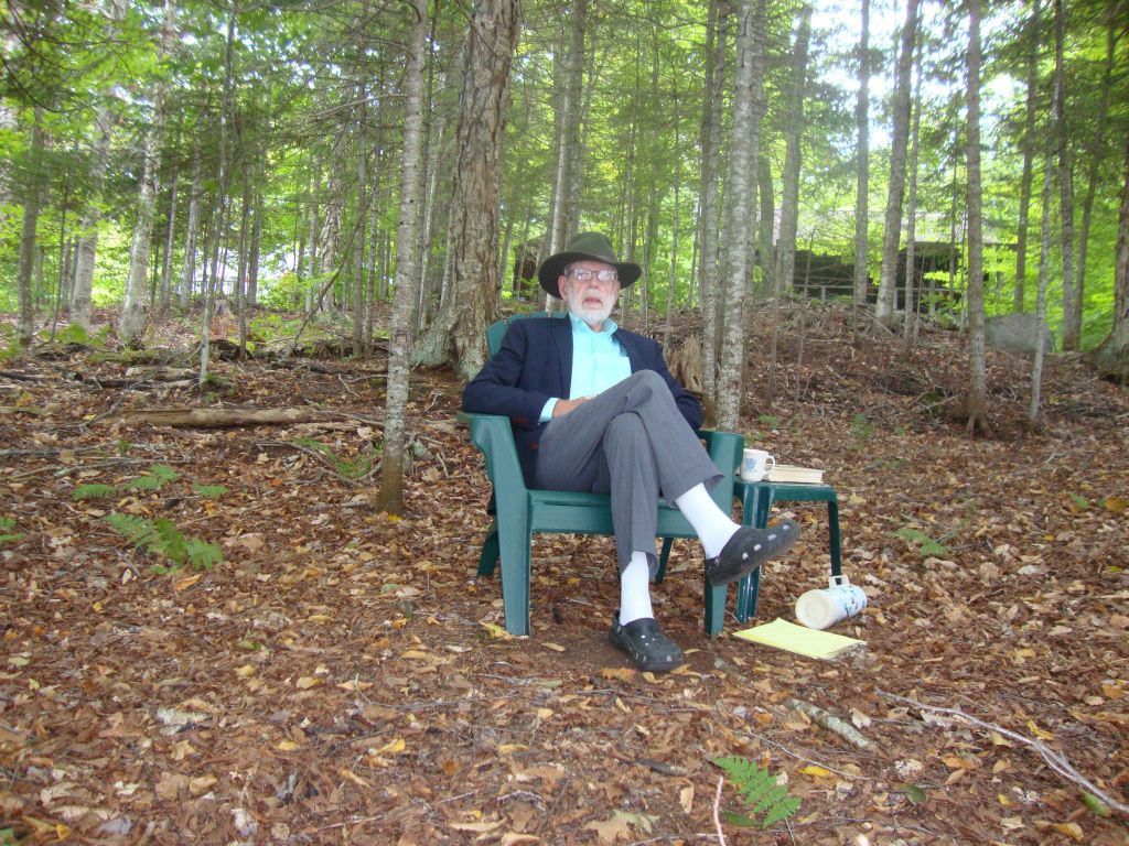 Reading at the Tentsite
Before we built the cabin we set up our Eureka Timberline 4 in the level area behind my left shoulder. I'm actually working out every exercise in George B. Thomas's Calculus, the textbook in my Cornell freshman engineering program! Great fun! (Sort of...)