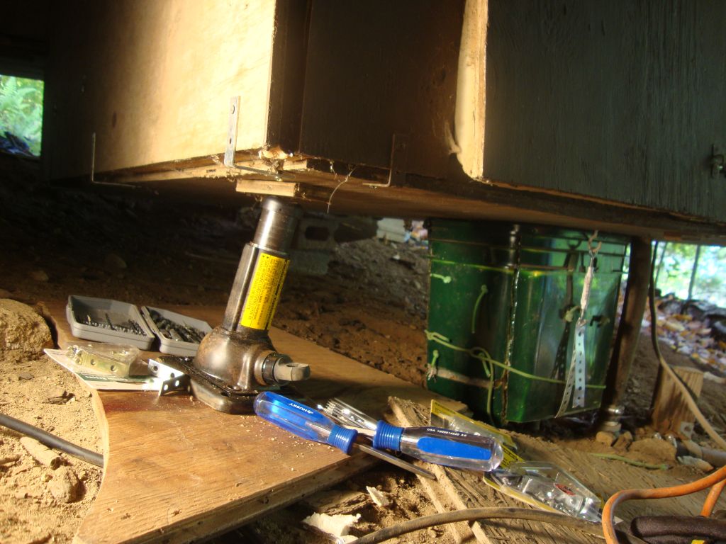 I got those Workin' on the Doghouse Blue
The floor had sagged a little, so I found and activated the Tacoma jack and installed a couple of additional screws. Two or three sub-freezing September nights had the heading tapes and doghouse light panel activated.