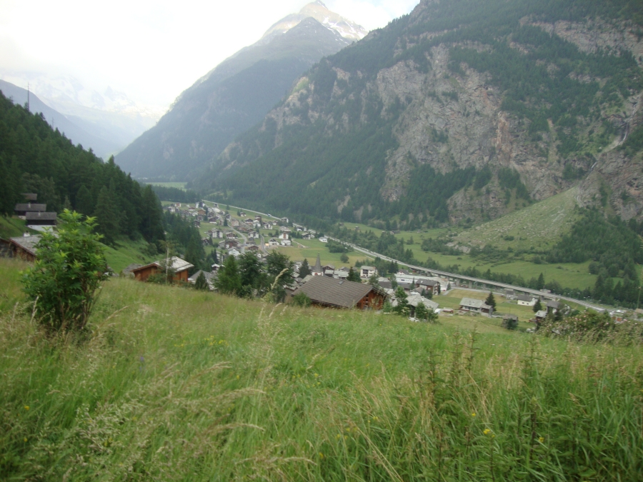 On Sunday, July 1, I'm rising above Randa about 8:30 AM, headed up to Europahutte. On my rest day yesterday I'd strolled up the road to Randa, meeting a nice young man who showed me the proper path and said I couldn't have made the hut on the ridge anyway: a major bridge is closed. My campground is just out of view at the left, in the valley.