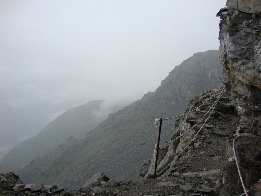 At 1:30 PM I'm approaching the notorious "Grosse Graben combe," where "signs warn trekkers to cross the danger areas quickly" (Reynolds, p. 204). I was caught in a rockslide there at 1:40 PM, hit by two flat, brown boulders I remember as about 3'x3'x1'. By great fortune I suffered only glancing blows: one to the right ankle, the other to the left calf. The calf developed a spectacular bruise a few days later.