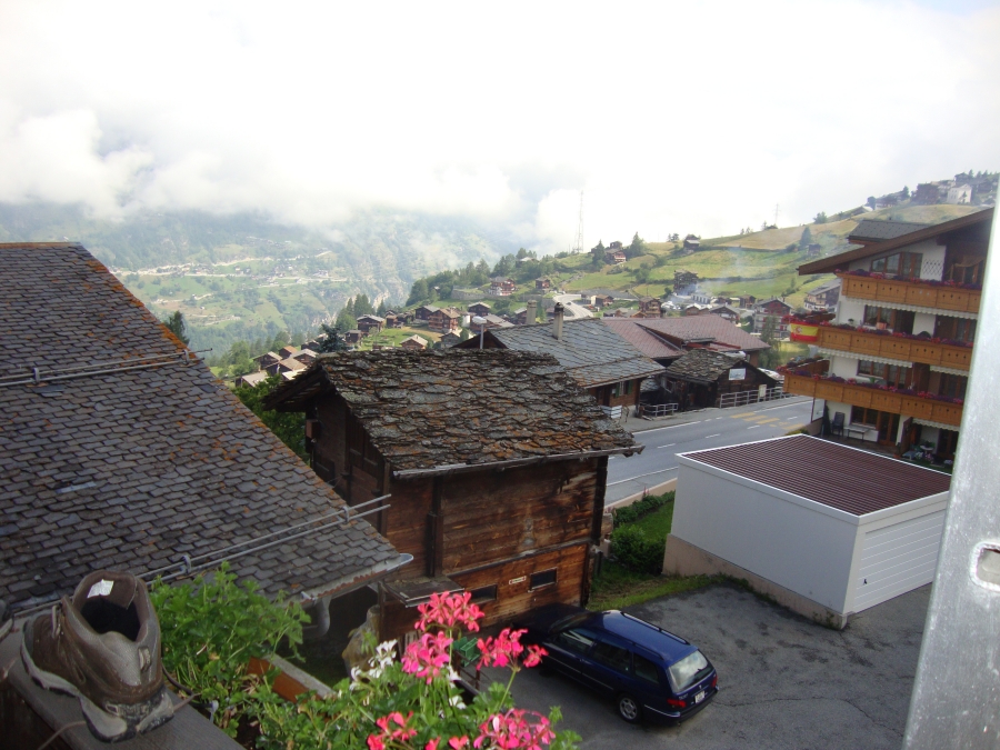 With accommodations sparse in Gasenried, I caught a bus for the short hop to Grachen. This is the Tuesday morning (July 3) view from my Hotel Alpha room's balcony, complete with a drying boot!