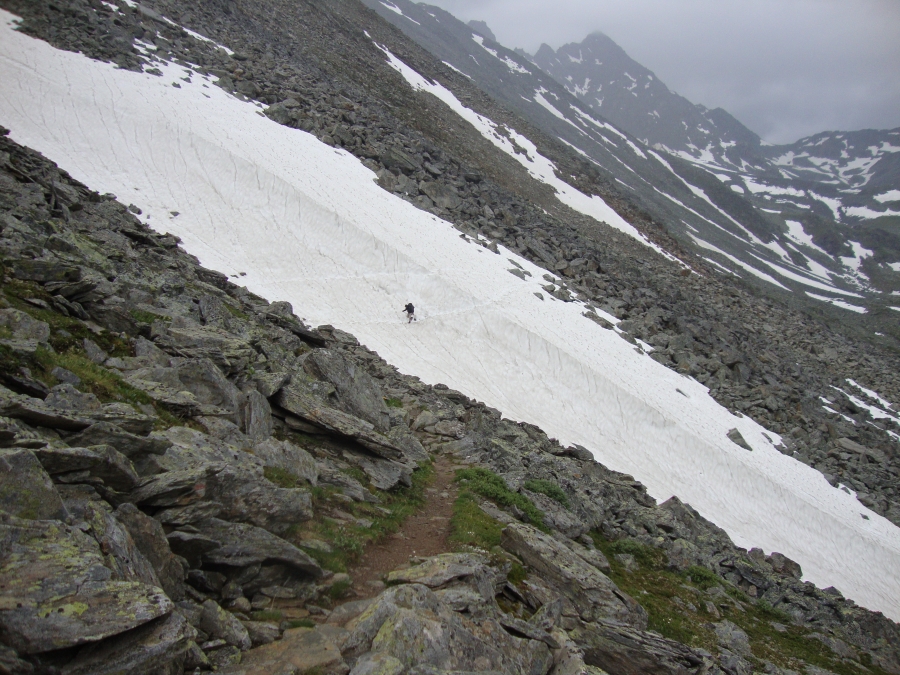 About 2:30 PM I came to my first significant snow field. Boot prints clearly showed others' paths and I stuck to them. That eastbound hiker is carefully avoiding areas in the lee of hidden boulders; protected from snow buildup they often contain holes into which others have postholed. 