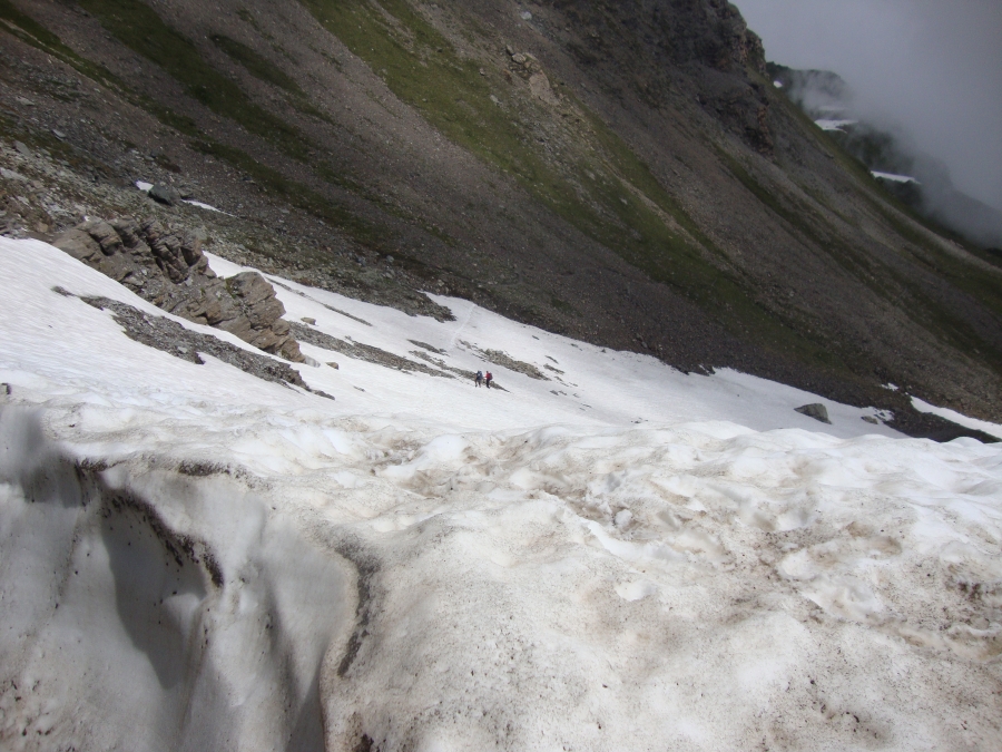 They've now descended through the snowfield on the east side of the Pass; I came up it to get here.