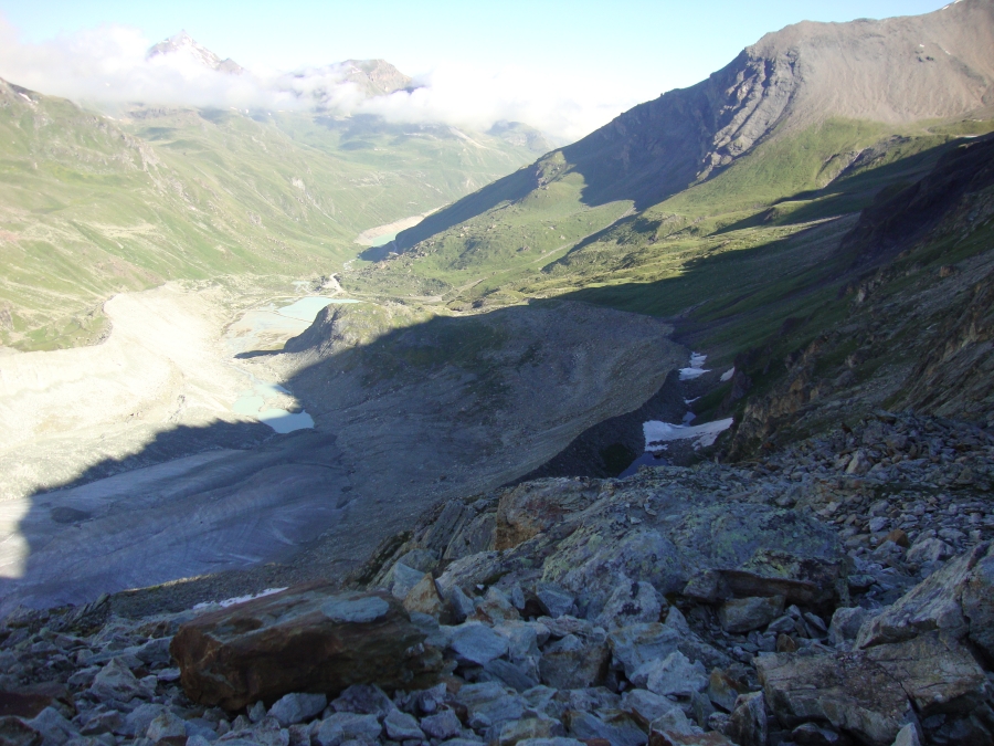 On the morning of Monday July 9, a rest day, this photo looks north over the path up from the lakes. The southern tip of Lac de Moiry is visible.