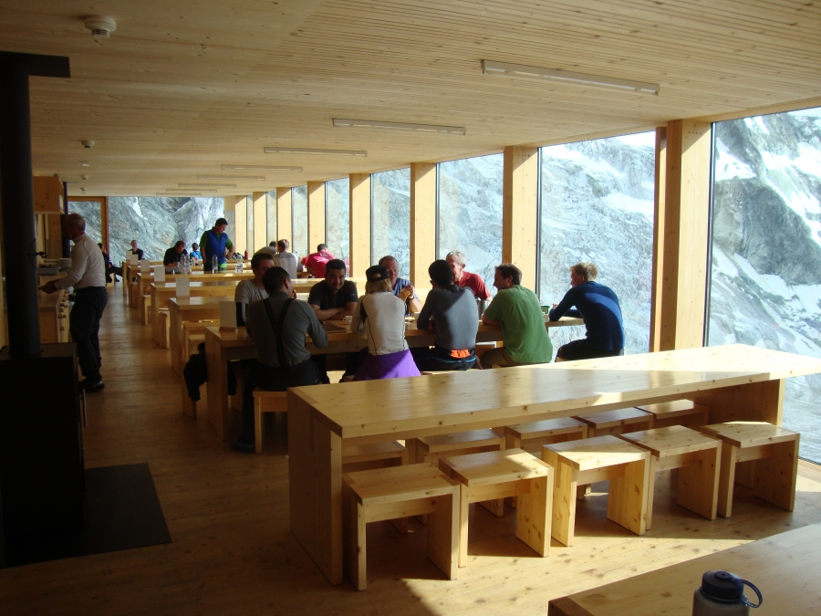At 6:00 PM, an hour before dinner, a group learning mountaineering had gathered in the dining room. Its leader seemed to be the woman with the purple sweater. She was pleasant and friendly when I sat next to her at dinner.