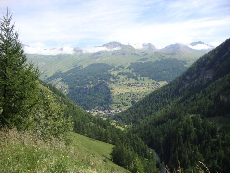 I finally got out of Les Hauderes about 10:30. This 11:30 photo, after 225m  of ascent, looks back north to it. La Sage may be above it to the left and La Forclaz to the right.