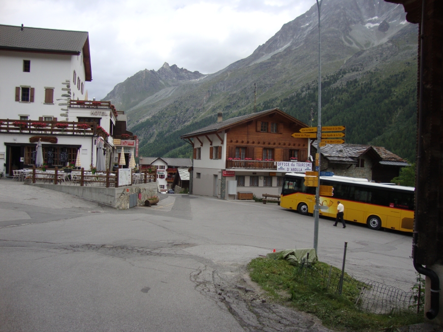 At noon on my first Arolla rest day, here's bustling downtown Arolla. We're actually looking in the direction of the campground. My  grocery store is beneath the red sign, behind yellow umbrellas, at the left.