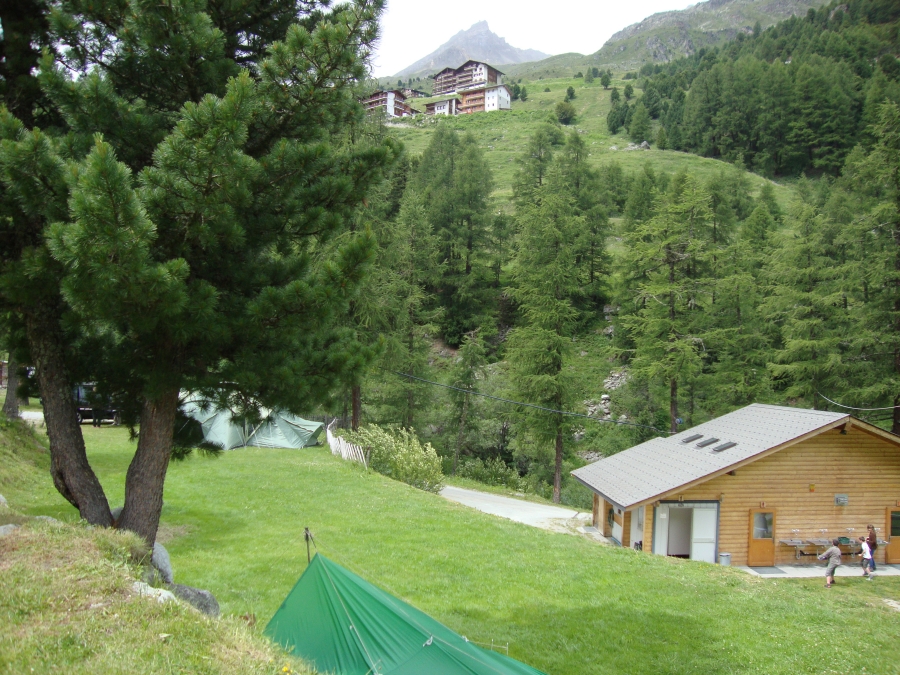 Here's Arolla from my site, a 20-minute climb. Level grassy sites, nice toilet and shower building, small store... but no shelter or even benches and tables for backpackers.