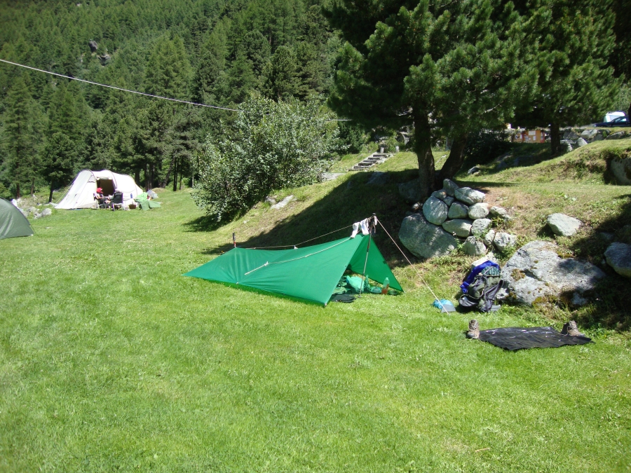 I'd decided to end my trek in Arolla. The Prafleuri, Mont Fort, and Le Chable stages looked long (11+ hours, for me), tough, and --- importantly --- lacking public transportation to Geneva. Saturday, July 14, I'm playing with the pitching of my tarp.